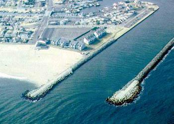 Human Impacts Breakwater A wall built in the ocean to reduce the size of
