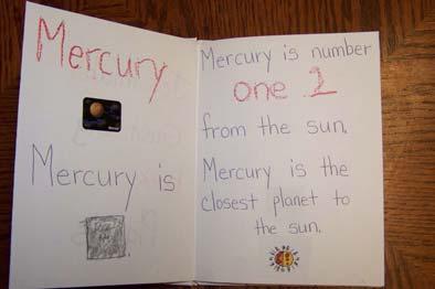 Have the child paste his Mercury sticker to the gray construction paper circle.