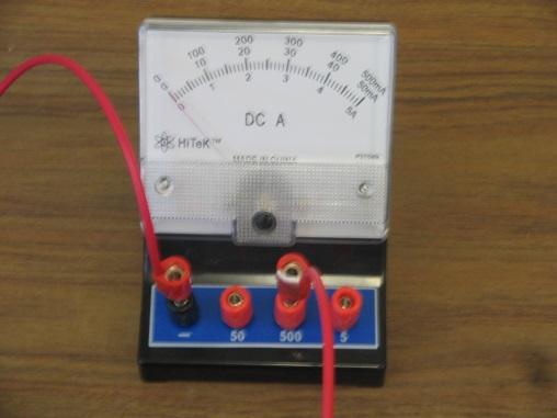 An ammeter measures how much current flows through a point in an electric circuit.