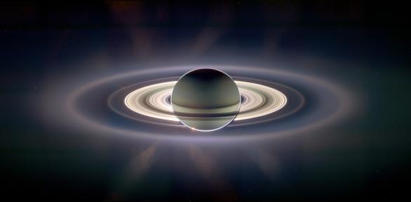 Particles from the Sun are pulled by Saturn's magnetic field toward