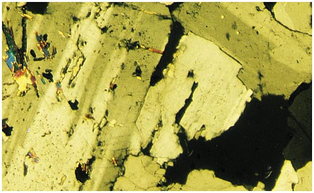 Photomicrograph of Granite Classification of Igneous Rocks Based on Mineral Composition and Texture Textures- reflect rate of cooling Phaneritic Pegmatite Aphanitic Porphyritic Phaneritic- mineral