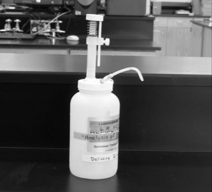 Add the thiosulfate solution from the buret in a fairly rapid stream, until the solution has a light yellow-orange color, indicating only a small quantity of iodine left in the solution.
