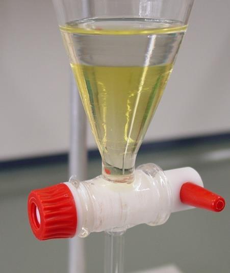 To find out which layer to reject, collect a few drops of the lower layer to a test tube and verify if the material is soluble in water (H2SO4) or not (1- bromobutane).
