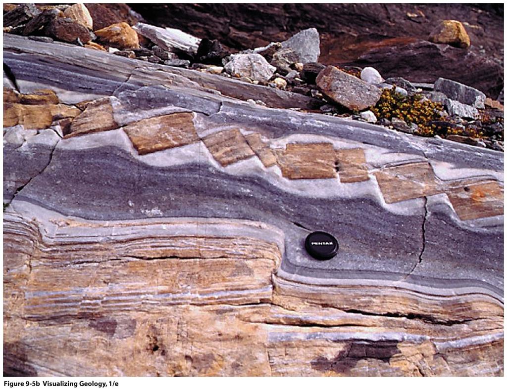 This rock responded to stress by folding and flowing by ductile deformation.