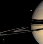 Saturn with Moons Titan and Tethys http://www.