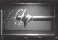 Sec. 1.6 / Conservation Laws 23 Fig. 1.12 A photograph of a cavitating propeller inside MIT s water tunnel. (Courtesy of Prof. S. A. Kinnas, Ocean Engineering Group, University of Texas - Austin.