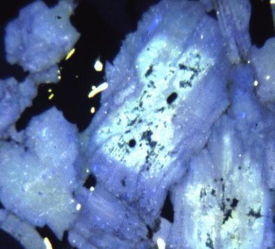 2 polarized light but apparent under cathodoluminescence is the fact that the plagioclase crystal is slightly fractured.