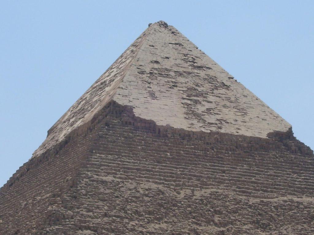 Originally, white limestone blocks called casing stones were fit onto each layer of blocks, giving the pyramid a smooth, reflective surface that