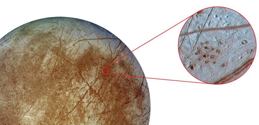 The dark patches in the inset photo of Jupiter s moon Europa might represent areas where water from an