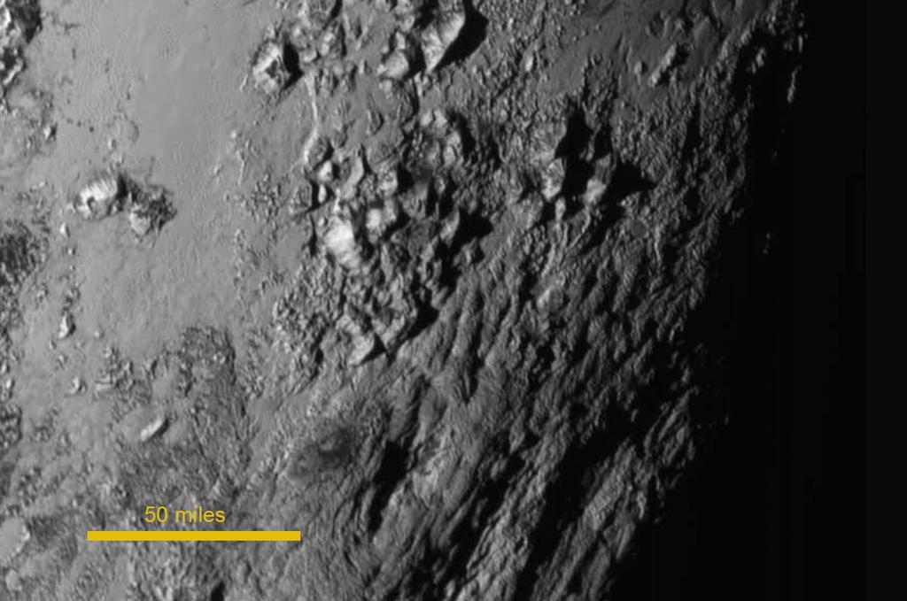 10 Pluto s surface New close-up images of a region near Pluto s equator reveal a giant surprise: a range of youthful mountains rising as high as 11,000 feet (3,500 meters) above the surface of the
