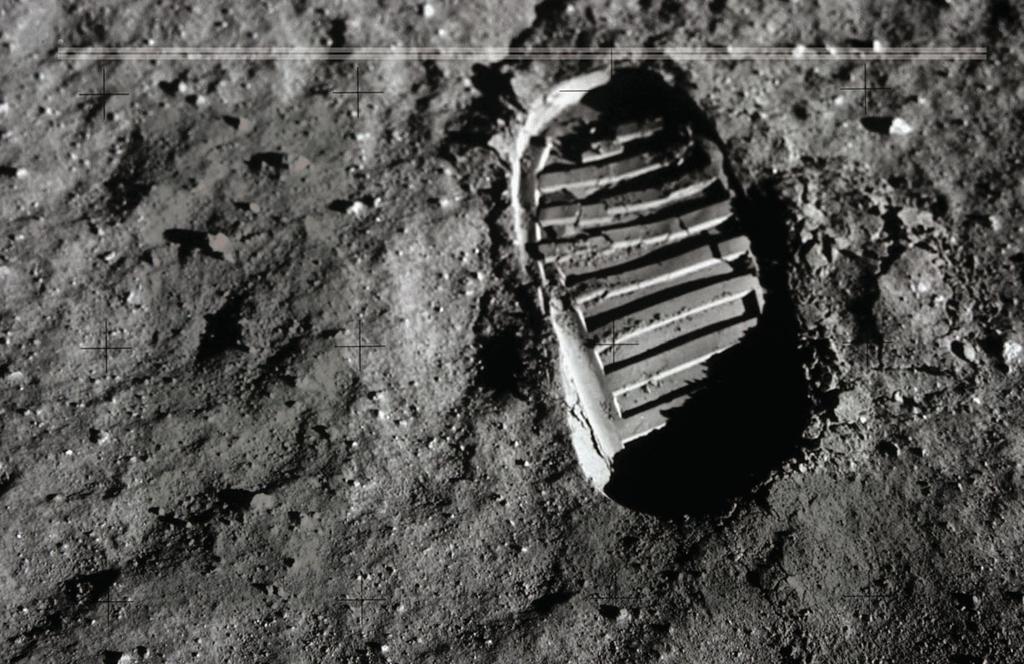 A Voyage into the Future THE IMPRINT OF HUMANKIND The footprints of the astronauts are clearly visible in the soil of the Moon. D uring the greater part of our history, the Moon was quite unreachable.