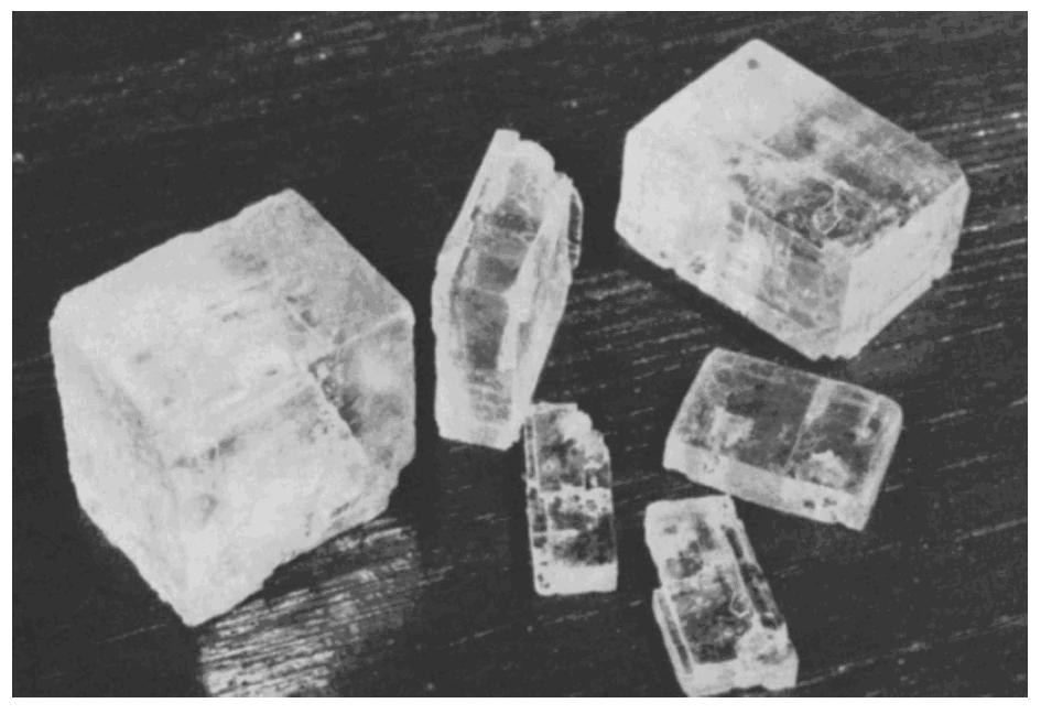 7. The photograph below shows a piece of halite that has been recently broken. 10.