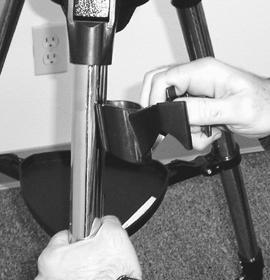 Attaching the Hand Control Holder The NexStar comes with a snap-on hand control holder that conveniently attaches to any of the tripod legs.