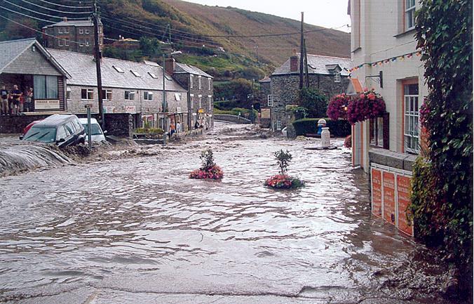 Explain how the Boscastle flood defence scheme benefits the local people and the environment.