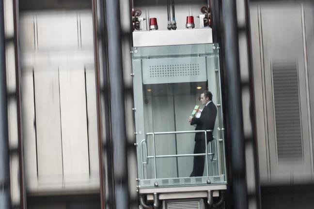 Power Example: An Elevator can lift a maximum of 900kg