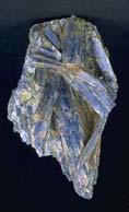 Andalusite, sillimanite and kyanite are identical in composition but the geometry of their internal arrangement is different. Sillimanite is an indicator of a medium- to high-grade of metamorphism.