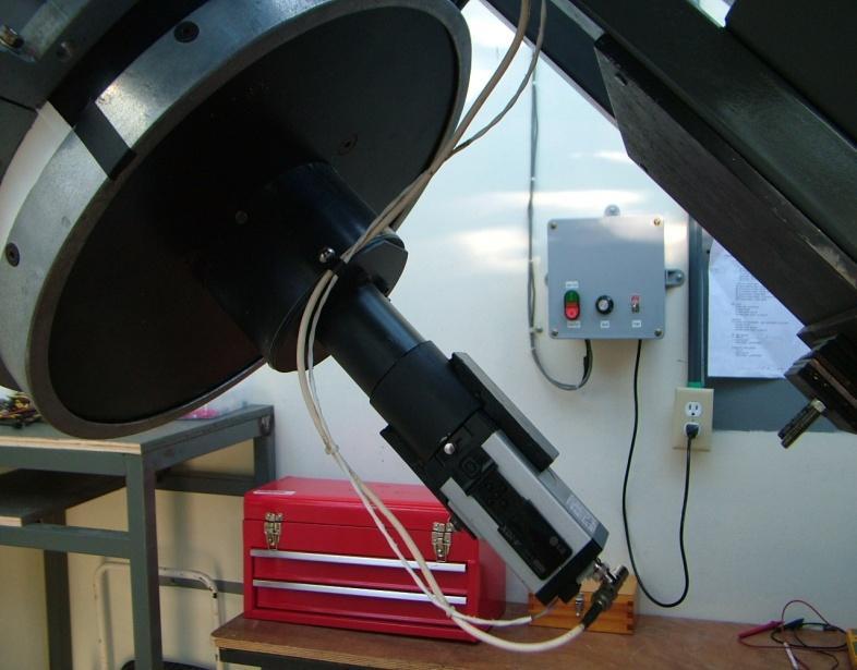 An auto-guiding system was made using a sensitive video camera (10-6 lux) mounted on