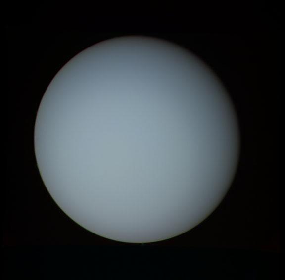 Uranus s Composition and Appearance The atmosphere of Uranus is composed of 83% hydrogen, 15% helium, 2% methane Methane absorbs red light, giving Uranus its blue-green