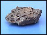Scoria rocks are igneous rocks which were formed when lava cooled quickly above ground.