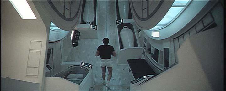 (the floor of the cabins is the inside of the outer edge of the spaceship) The rotating spaceship has an acceleration