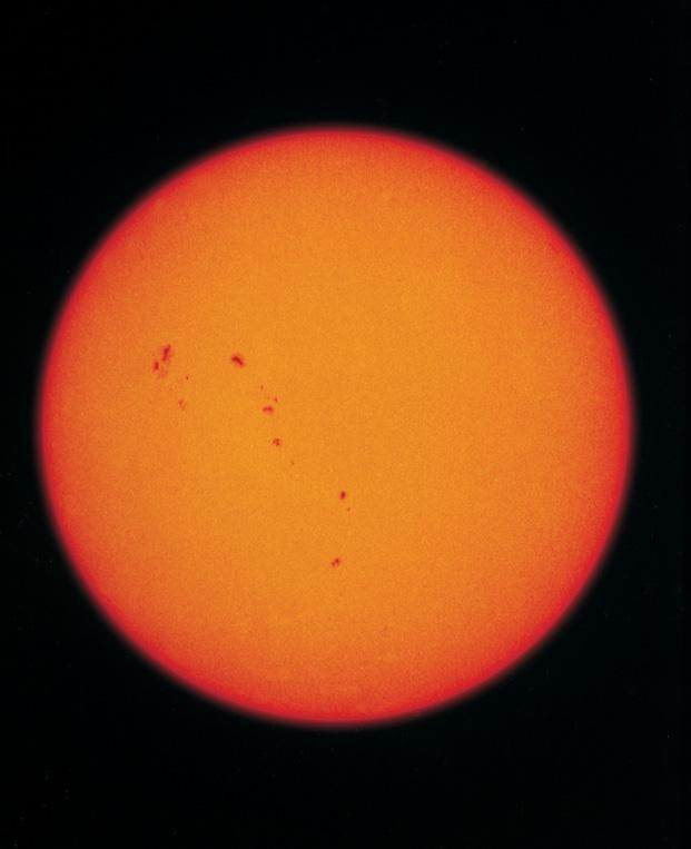 Changing Features of the Sun: Sunspots Cooler regions of magnetic activity Seem to