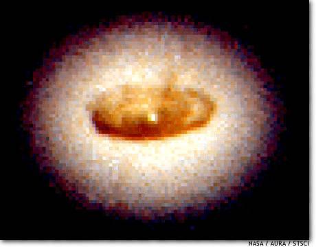 The accretion disk around a black hole in the center of the M87 galaxy.