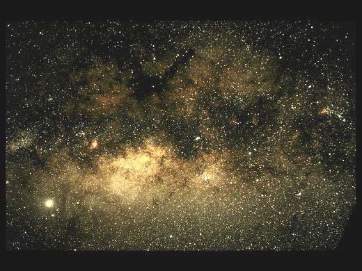 The Galactic Center Our view (in visible light) towards the galactic center (GC) is heavily obscured by gas and dust Extinction by 30
