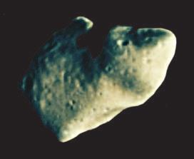 Asteroids An asteroid is a rocky mass that revolves around the Sun and is much smaller than a planet.