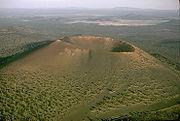 Types of Volcanoes Cinder cone is small volcano with a steep conical hill of volcanic fragments that accumulate around and downwind from a volcanic vent.