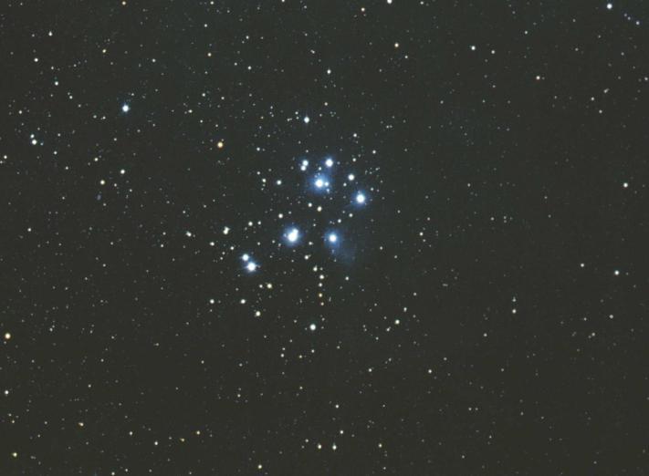 It is visible to the naked eye initially looking like a patch of light. Closer observation will reveal a cluster of up to seven stars. Using a good pair of binoculars many more stars will be seen.