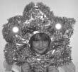 (a) 5 School play Polly is in a school play. bulbs She is dressed as a star. The star costume has bulbs which light up. star The picture below shows the circuit that makes the star light up.