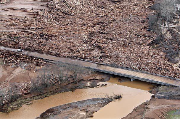December 1-3, 2007 Flood Acres of timber and debris backed up behind this bridge in the