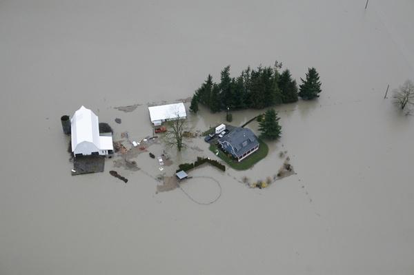 A 100-year flood is a flood that has a return period of 100 years OR a probability