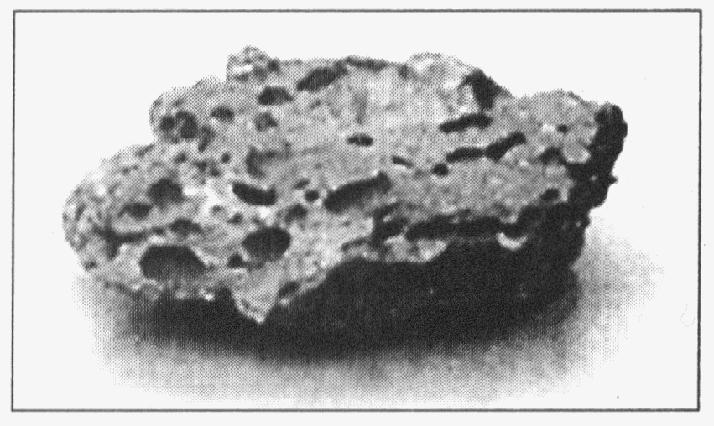 36. Which graph best represents the relative densities of three different types of igneous rock? 1) 37. The photograph below shows an igneous rock.