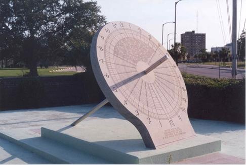 sundial at the north pole in summer, hourly marks would have a separation of 15 degrees. One day equals 24 hours, and one rotation divides into 360 degrees.