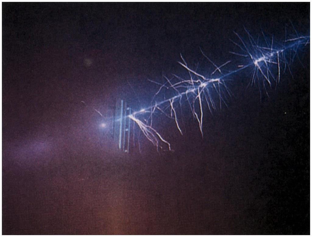 E due to an infinite line charge Corona discharge around a high voltage power line, which roughly indicates the electric
