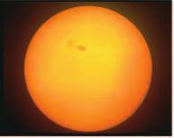 The Active Sun The most conspicuous features on the surface of the sun are the dark regions.