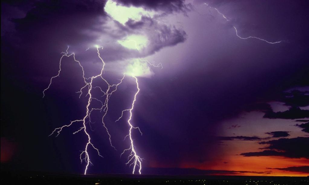 Lightning During a lightning strike, large amounts of electric charge move between a cloud and