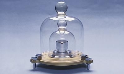 THE KILOGRAM The kilogram is defined to be the mass of a platinum-iridium cylinder kept at the International Bureau of