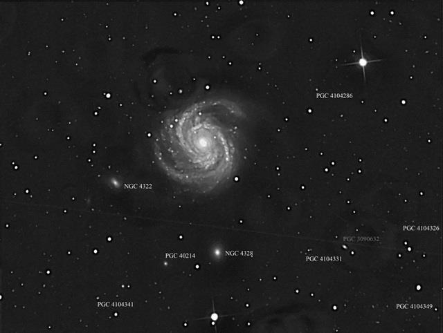 The annotated photo contains 8 additional galaxies.
