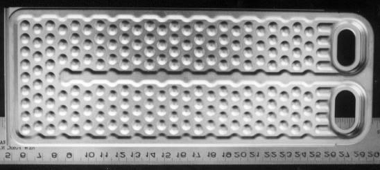 Plate Evaporator C Figure D.3 Photograph of plate C showing details of internal structure. 9 8 7 Freqeuncy (Hz.