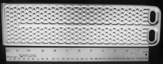 Plate Evaporator F Figure D.5 Photograph of plate F showing details of internal structure. 6 5 Frequency (Hz.