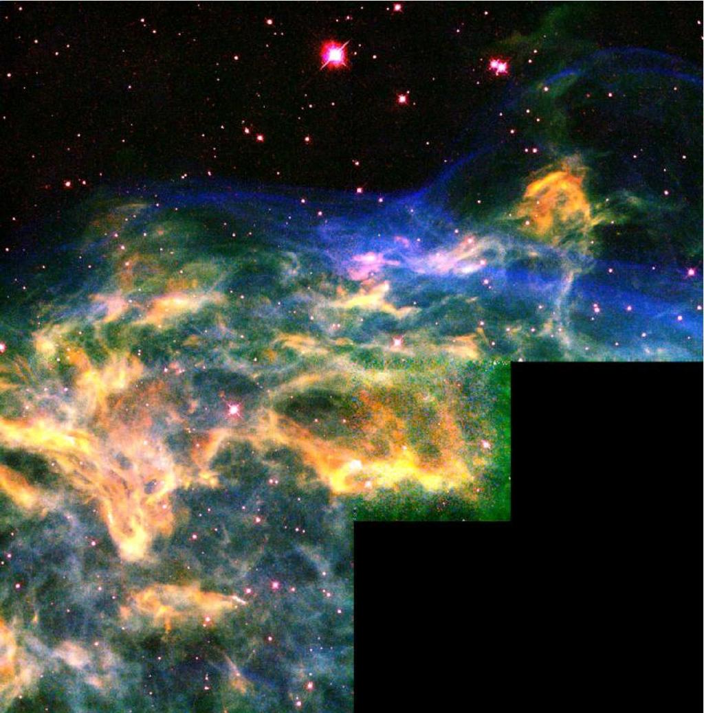 INTRODUCTION 5 Figure 1.2: The Crescent Nebula, NGC 6888, was formed by the collision between a Wolf-Rayet wind driven shell and the older red supergiant shell.