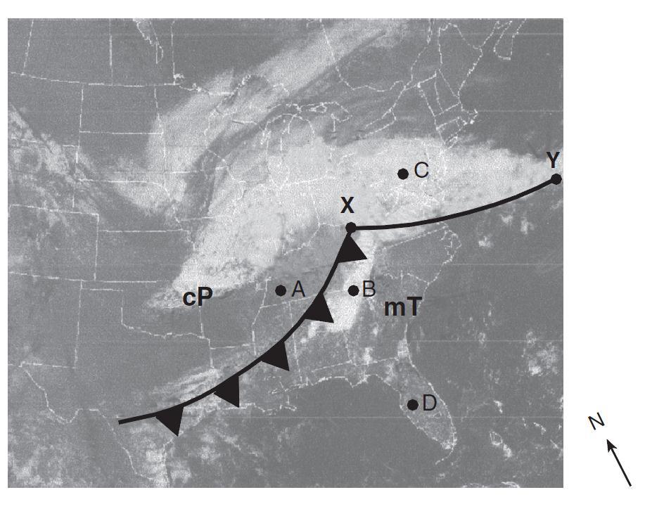 Base your answers to questions 20 through 24 on the satellite image shown in your answer booklet. The satellite image shows a low-pressure system over a portion of the United States.