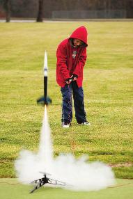 LESSON 11.8 A model rocket blasts off from the ground and peaks in 3 seconds at 144 feet. a. When will the rocket hit the ground? b. Write a function for the height h feet of the rocket at time t seconds.
