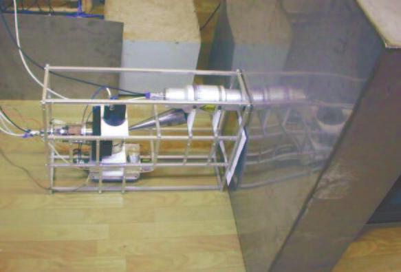 FIG. 3. Left: one NNA/APT basic module consisting of one APT neutron generator and 12 gammaray detectors. Right: 3D NNA Scanner for Inspection of Sea Containers. 1 NNA/APT basic modules.