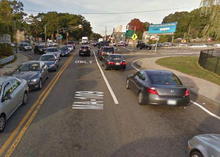 The queue from the VFW Parkway through movement in both the northbound and southbound directions frequently backs up such that vehicles cannot access the exclusive left-turn lane.