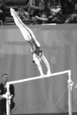 25. A gymnast is swinging in a vertical circle around a bar. Explain, in terms of energy, why the gymnast s velocity is slowest at the top and fastest at the bottom of the circle?