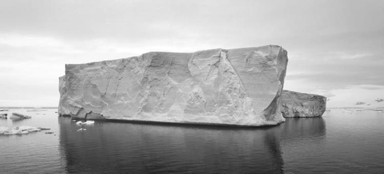 3 Figure 1 shows an iceberg floating in the sea. Figure 1 0 1. 4 The iceberg has a mass of 11 200 kg The volume of the iceberg is 12.