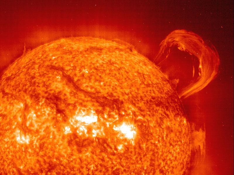 Prominences Prominences are ionized gases trapped by